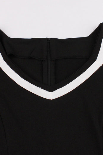 V-hals korte mouwen zwarte jaren 1950 jurk met riem