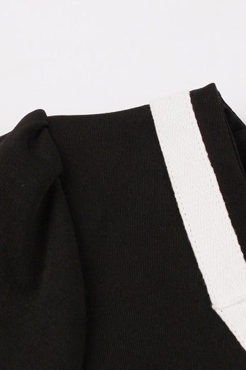 V-hals korte mouwen zwarte jaren 1950 jurk met riem