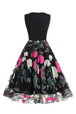 Fuchsia en zwarte vintage jaren 1950 jurk