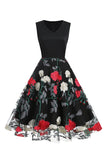 Fuchsia en zwarte vintage jaren 1950 jurk