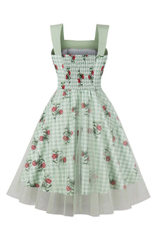 Groene geruite schommel jaren 1950 jurk met bloemen bedrukt
