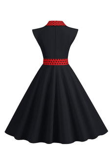 Zwarte stippen swing jaren 1950 jurk met strik