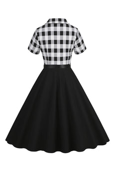 V-hals korte mouwen geruit zwart jaren 1950 jurk met riem