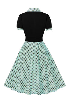 Groene korte mouwen polka dots 1950s jurk met riem