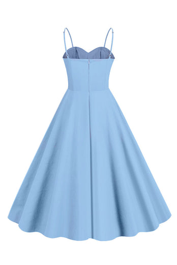 Lichtblauwe stippen spaghettibandjes 1950s jurk