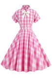 Roze geruite Bowknot jaren 1950 jurk met korte mouwen