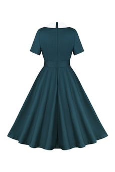Pauwblauw A Line Swing jaren 1950 jurk met riem