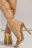 Gouden open teen stiletto sandalen met vetersluiting