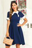 Hepburn Style Jewel Neck Navy jaren 1950 jurk met bowknot