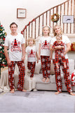 Familie bijpassende kerstpyjama met rode plaid